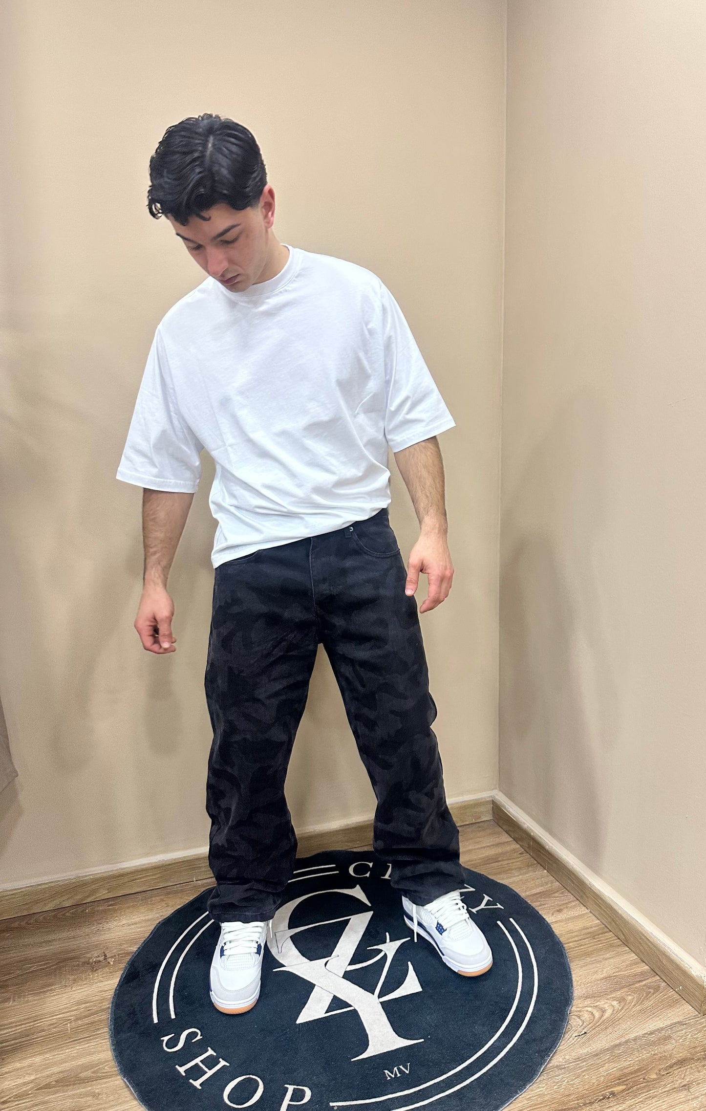 Jeans baggy mimetico